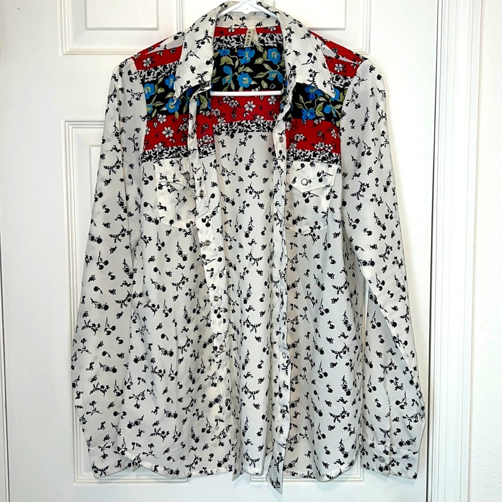 Roper Women’s cashmere button up top.